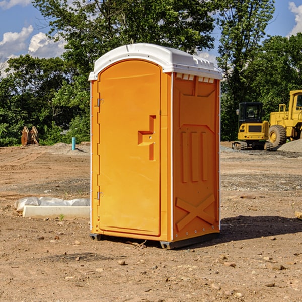 how often are the porta potties cleaned and serviced during a rental period in Treloar